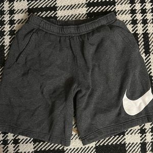 Nike dark gray, baggy shorts above knee